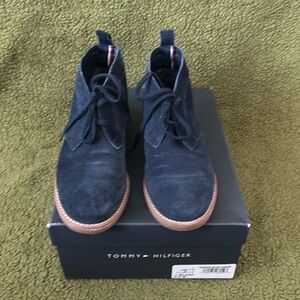 Blue suede tie up booties by Tommy Hilfiger
Dark blue